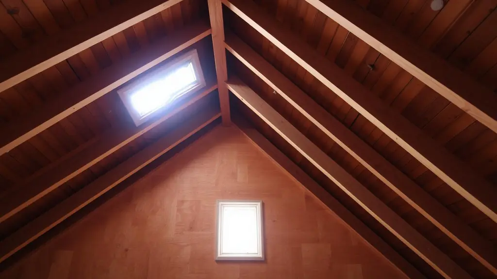 Wooden roof framing and rafter connections seen inside an attic
